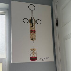 Luxury Gucci Designer Wall Art with Gold and Red Accents